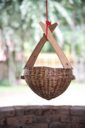 Bamboo Basket for dip up water at Nam Hoo Temple,Pai district Mae hong son province Thailandの写真素材