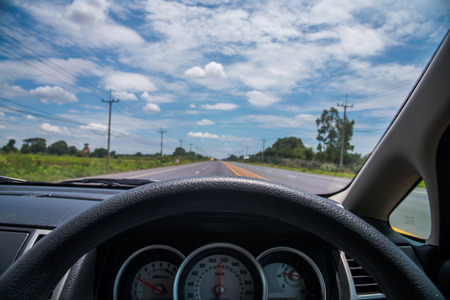 Travel journey from a car cockpit - Concept of adventure trip on the road