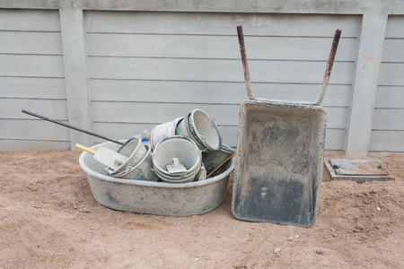 bucket and cart for pour the cement for constructionの写真素材