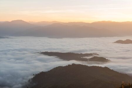 Morning fog on mountians at Mon Thu Le-Mon kluy loung, Tak province, Thailand,Sun shining through...