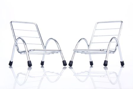 close up of silver steel chair isolated on white background.の写真素材