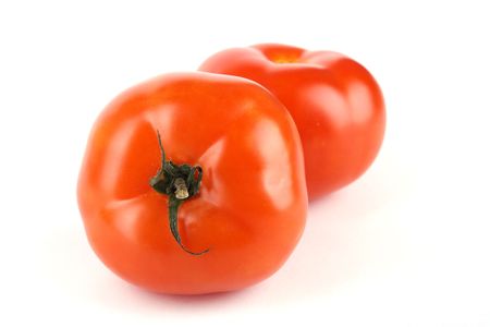 Close up two tomato isolated on white backgroundの写真素材