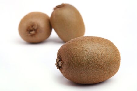 Focus a kiwi isolated on white backgroundの写真素材