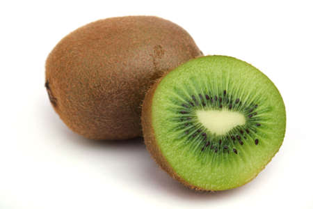 Close up an kiwi and half a tablet of kiwi on a white backgroundの写真素材