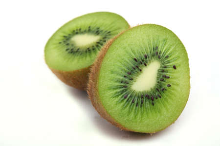 Close up two half a tablet of kiwi on a white backgroundの写真素材