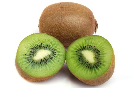 Close up an kiwi and two half a tablet of kiwi on a white backgroundの写真素材