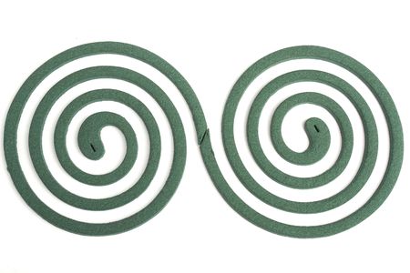Two spiral. Mosquito coil on black background.の写真素材
