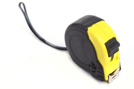 Close up tape measure isolated on a white background.の写真素材