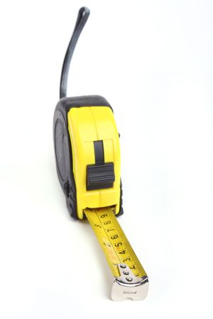 Close up tape measure isolated on a white background.の写真素材
