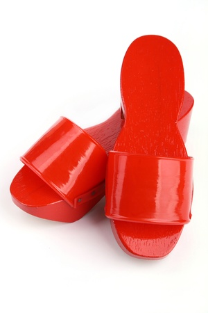 Pair of brightly painted red clogs, from Chinatown in Melaka.の写真素材