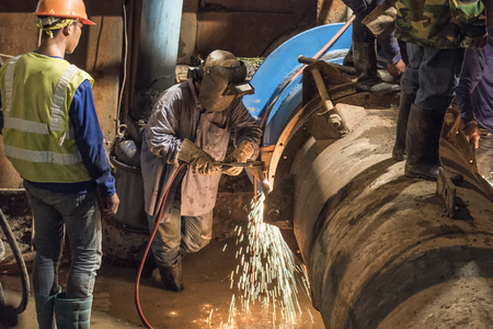 Pipe welding on the pipeline construction siteの写真素材