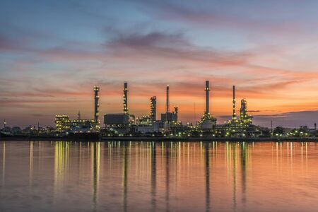 Oil refinery with sunriseの写真素材