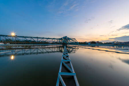 Water treatment plant with sunsetのeditorial素材