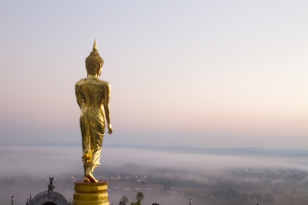 Buddha standing on a mountain Wat Phra That Khao Noi, Nan Province, Thailandの写真素材