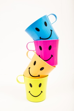 Glass,Plastic smile set for picnic in many colors on white.の写真素材