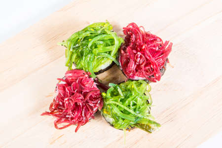 Sushi seaweed rolls on wooden floors.の写真素材