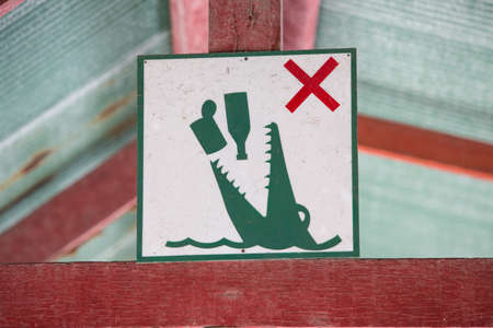 Do not stop feeding the crocodile.の写真素材