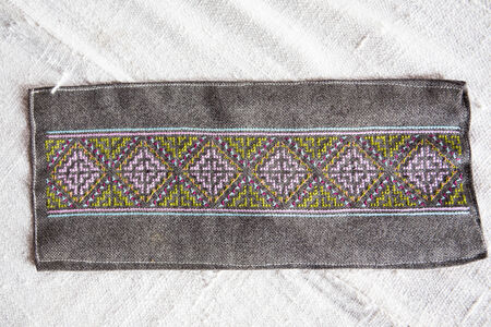 textile texture,Embroidery designs indigenous to Thailand.