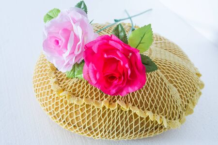 Sponge Cushion Rose on black on white background.の写真素材