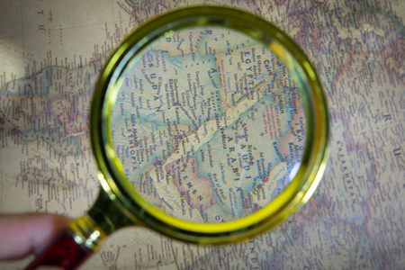 Magnifying glass  on the map Background