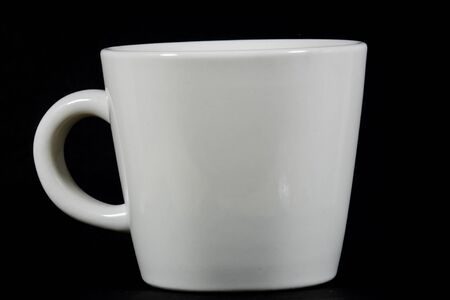 White Coffee Cup on a black backgroundの写真素材