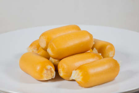 Sauteed Chicken Sausage on a white backgroundの写真素材