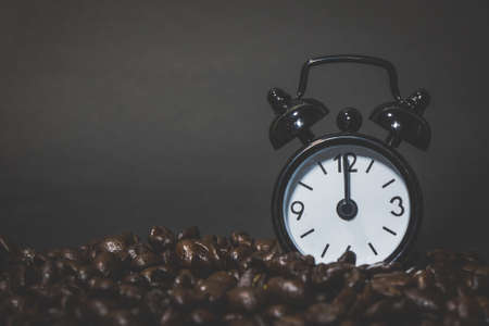 Clock  Alarm on Coffee beansの写真素材