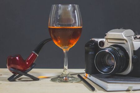 smoking pipe and  Wild Red with Camera on Bookの写真素材
