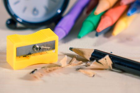 Sharpened Pencil on wooden backgroundの写真素材
