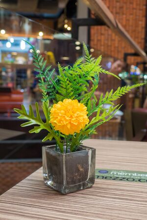 Flower vases on wooden tableの写真素材