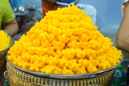 (Tong Yib)Traditional Thai Dessert. Thai dessert .Thai sweet made of yolk egg and drop in sugar syrup.の写真素材
