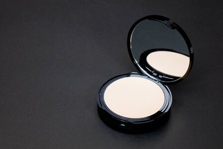 Powder  for Women To make her look beautiful at work on a black background.の写真素材