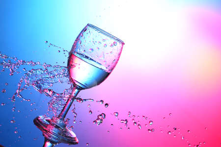 Background color splash of transparent glass beadsの写真素材