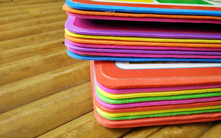 kid learning book on wood tableの写真素材