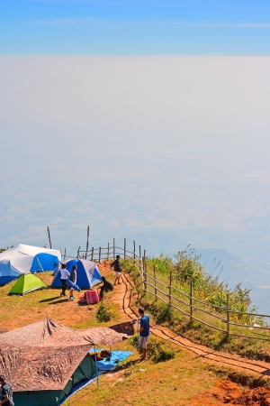 Tourist is camping in front of cliff の写真素材