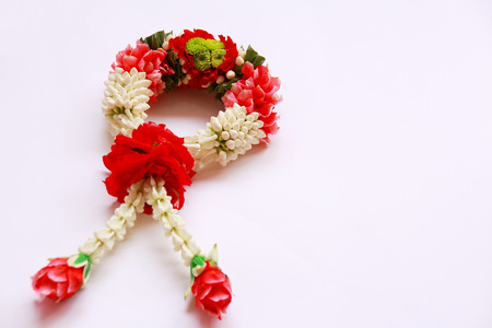 Garlands of jasmine flowers on a white backgroundの写真素材