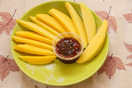 mango with sweet fish sauce Thai foodの写真素材