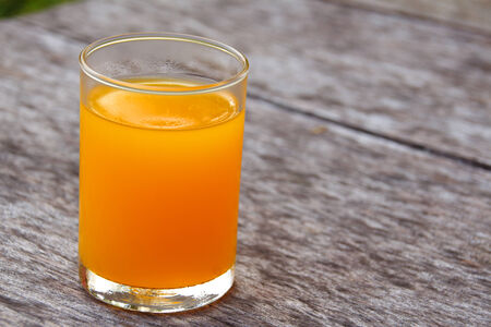 orange juice on the tableの写真素材