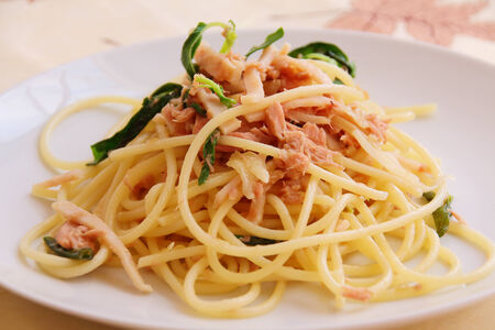 spaghetti fried basil leave with tunaの写真素材