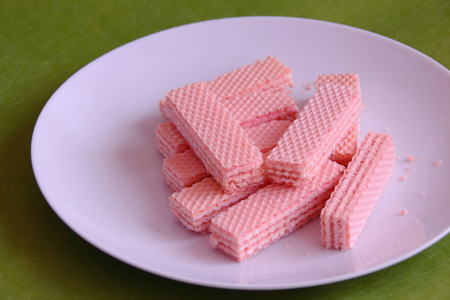 Waffles in a dish on the tableの写真素材