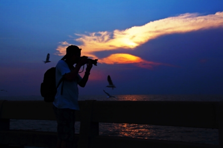 Twilight sky and Men photography の写真素材