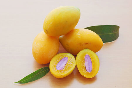 marian plum on the wooden tableの写真素材