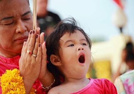 Ang Thong, Thailand-July 11,2014: Buddhists and monks meditation round the temple, in Asaha Puja Day and the beginning of Buddhist Lent, at Wat Muang- Ang Thong, Thailand.のeditorial素材