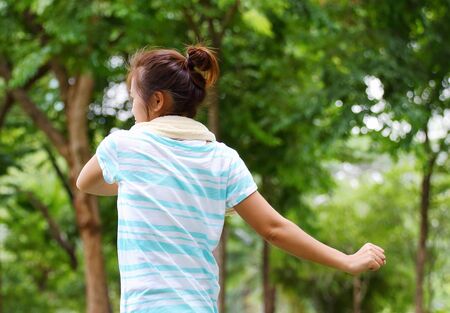 Asian women are exercising in the parkの写真素材