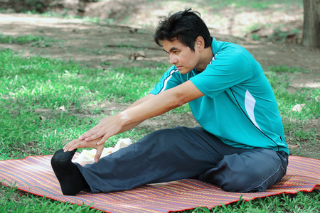 Asian man exercising in the parkの写真素材