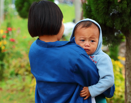 Chiang Mai, Thailand - October 18: Peace Karen in the watershed The Tenasserim Mountains Borders Thailand - Burma, at the Ban Mae Klang Luang in Chiang Mai, Thailand on October 18, 2014のeditorial素材