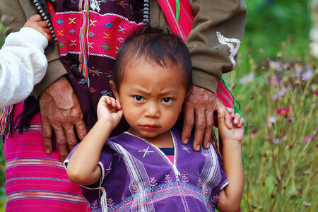 Chiang Mai, Thailand - October 18: Peace Karen in the watershed The Tenasserim Mountains Borders Thailand - Burma, at the Ban Mae Klang Luang in Chiang Mai, Thailand on October 18, 2014のeditorial素材