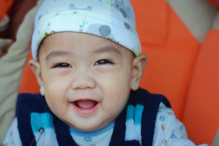 smiling asian baby, close-upの写真素材