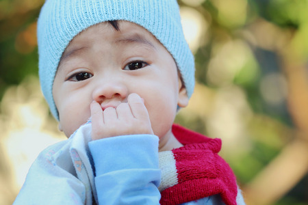 Asian boy was sick and runny nose, close upの写真素材
