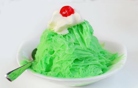 Snowflake ice cream flavor cantaloupe and whipping cream on white backgroundの写真素材